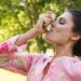 woman using inhaler asthma
